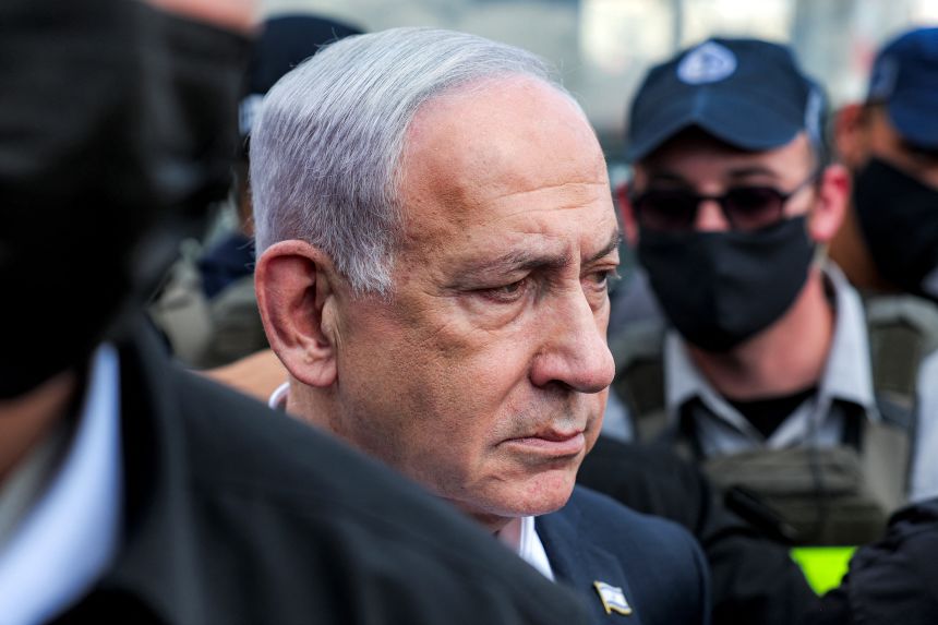 Israel's Prime Minister Benjamin Netanyahu visits the scene of a shooting in Jerusalem on September 8.