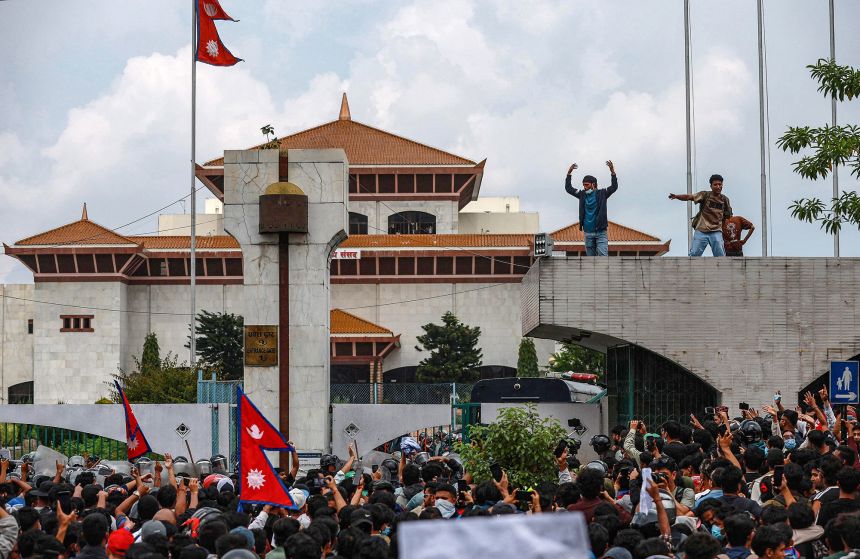 Demonstrators gathered outside Nepal's parliament, in the capital, Kathmandu, on Monday, condemning government corruption.