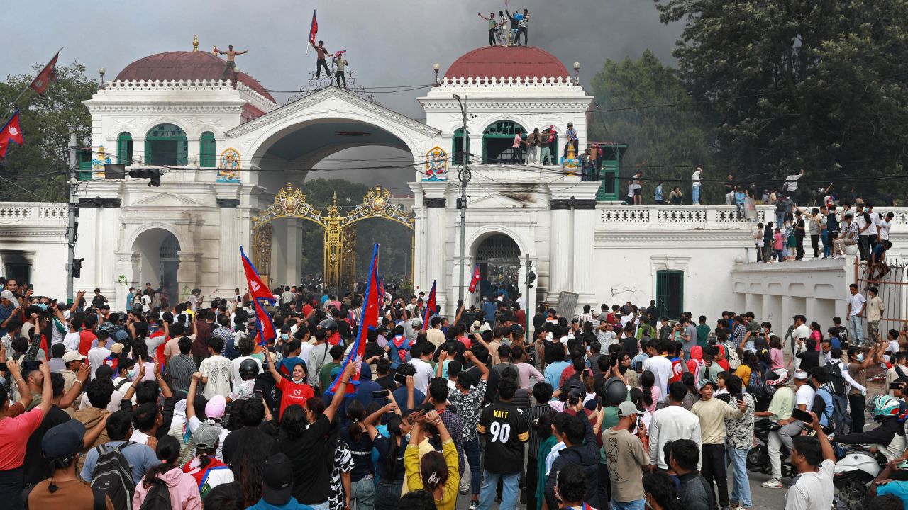 Protesters gather at the main administrative building for the Nepal government, in Kathmandu on September 9.