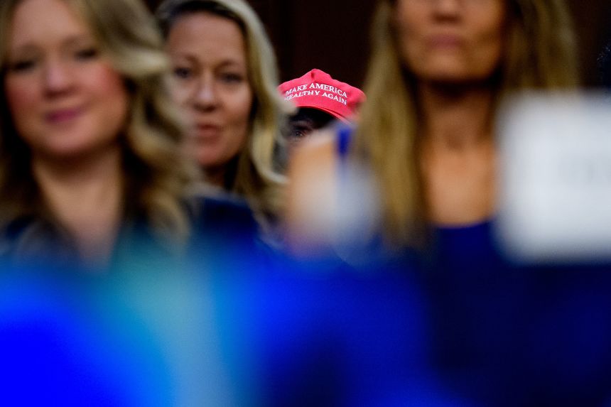 A woman wears a red hat reading "Make America Healthy Again" during a Senate Homeland Security and Government Affairs Subcommittee Hearing, on Capitol Hill on September 9, 2025.