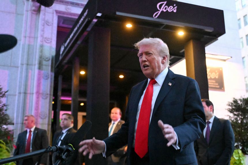 President Donald Trump speaks to reporters outside the restaurant Joe's Seafood, Prime Steak & Stone Crab in Washington, DC, on Tuesday, September 9.