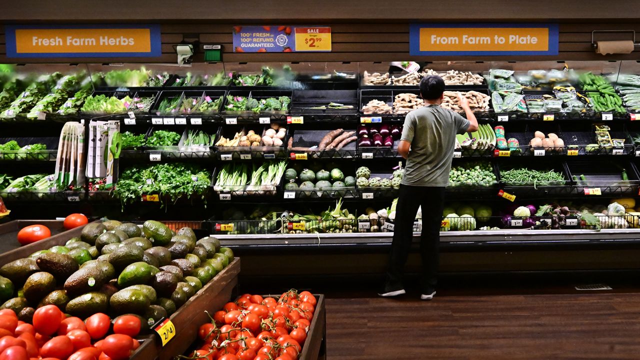 A man shops for produce at a supermarket in Monterey Park, California on September 9, 2025.