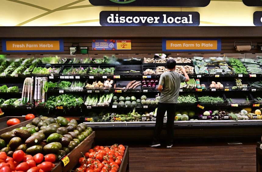 A man shops for produce at a supermarket in Monterey Park, California on September 9, 2025.