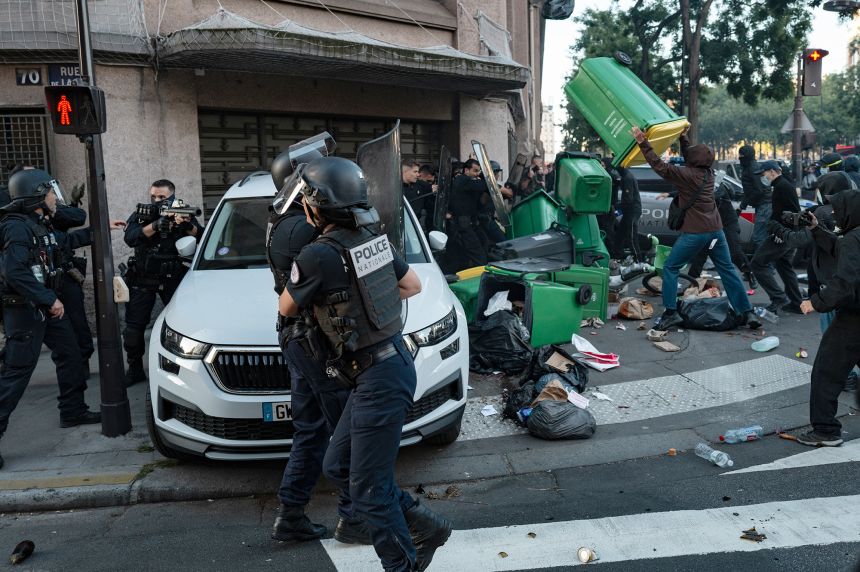 In Paris, several hundred students and protesters block the Helene Boucher high school.