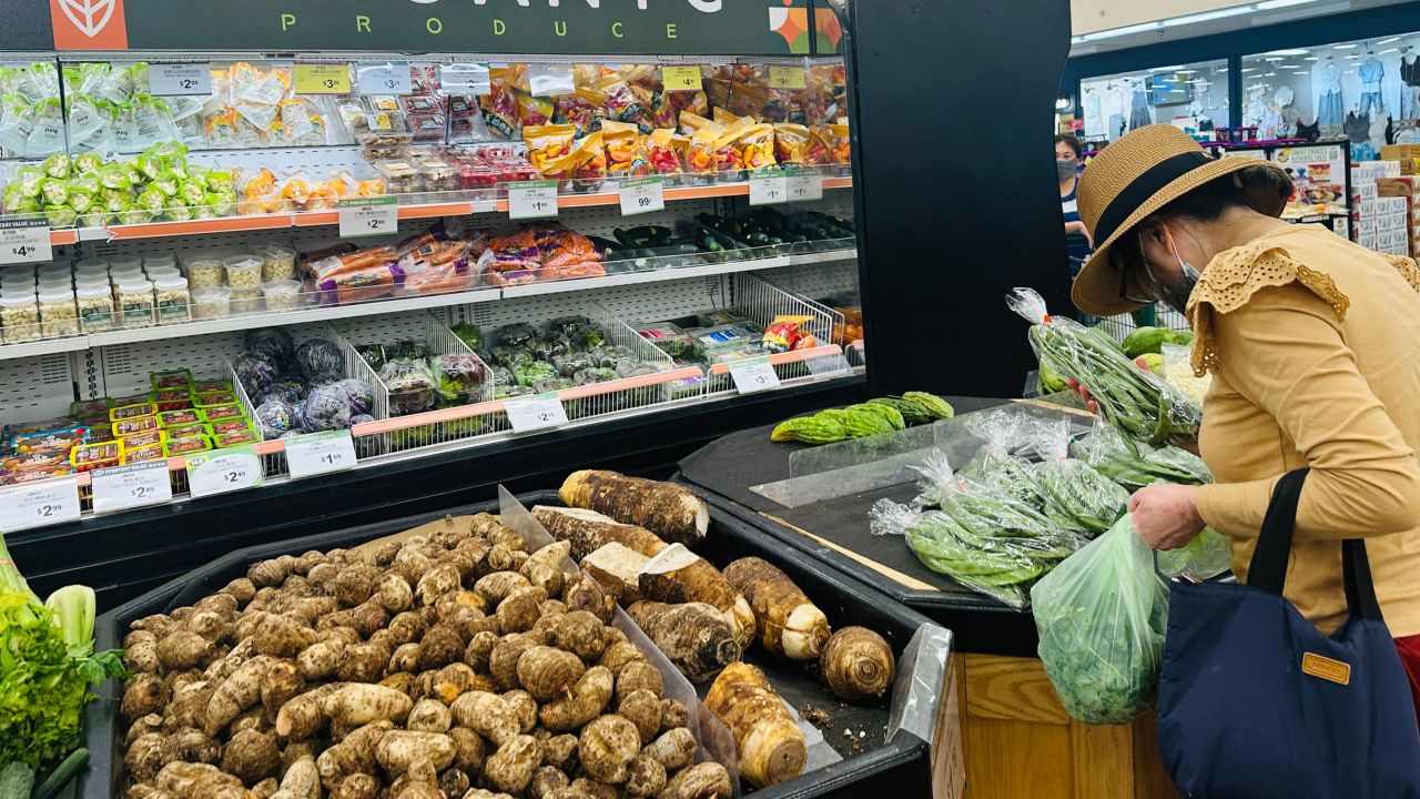 A woman shops for produce at a supermarket in Alhambra, California, on September 10, 2025.