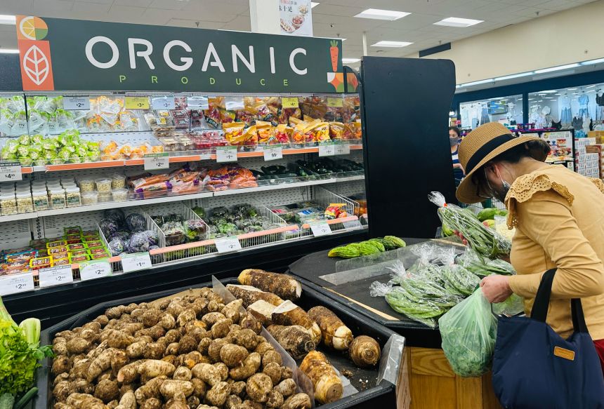 A woman shops for produce at a supermarket in Alhambra, California, on September 10, 2025.