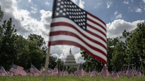 A single flag is planted in memory of Charlie Kirk, according of organizers at the Young America's Foundation, alongside a field of flags marking the 24th anniversary of the 9/11 terrorist attacks, outside the US Capitol in Washington, DC on September 11, 2025.