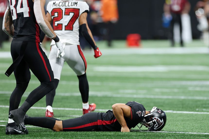 Younghoe Koo of the Atlanta Falcons reacts after missing a field goal against the Tampa Bay Buccaneers during the fourth quarter at Mercedes-Benz Stadium on September 7 in Atlanta.