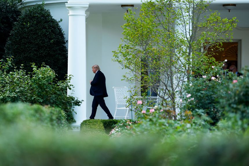 President Donald Trump walks on the South Lawn of the White House before boarding Marine One on September 11.