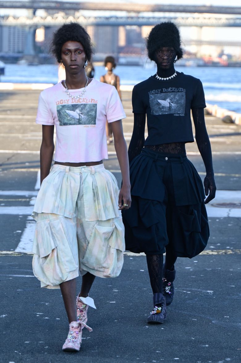 Collina Strada models — and their shadow selves — walked a Manhattan pier just before sunset.