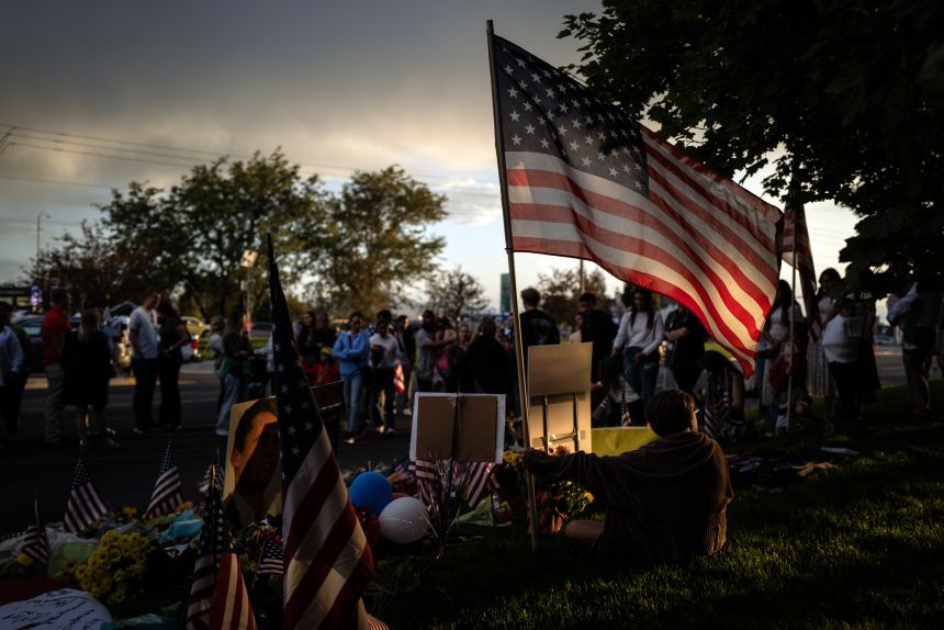 Mourners gather outside a memorial for political activist Charlie Kirk on the grounds of Utah Valley University on September 13, in Orem, Utah.