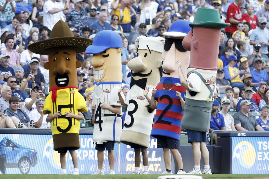 The racing sausages are seen during a Milwaukee Brewers game on September 14.