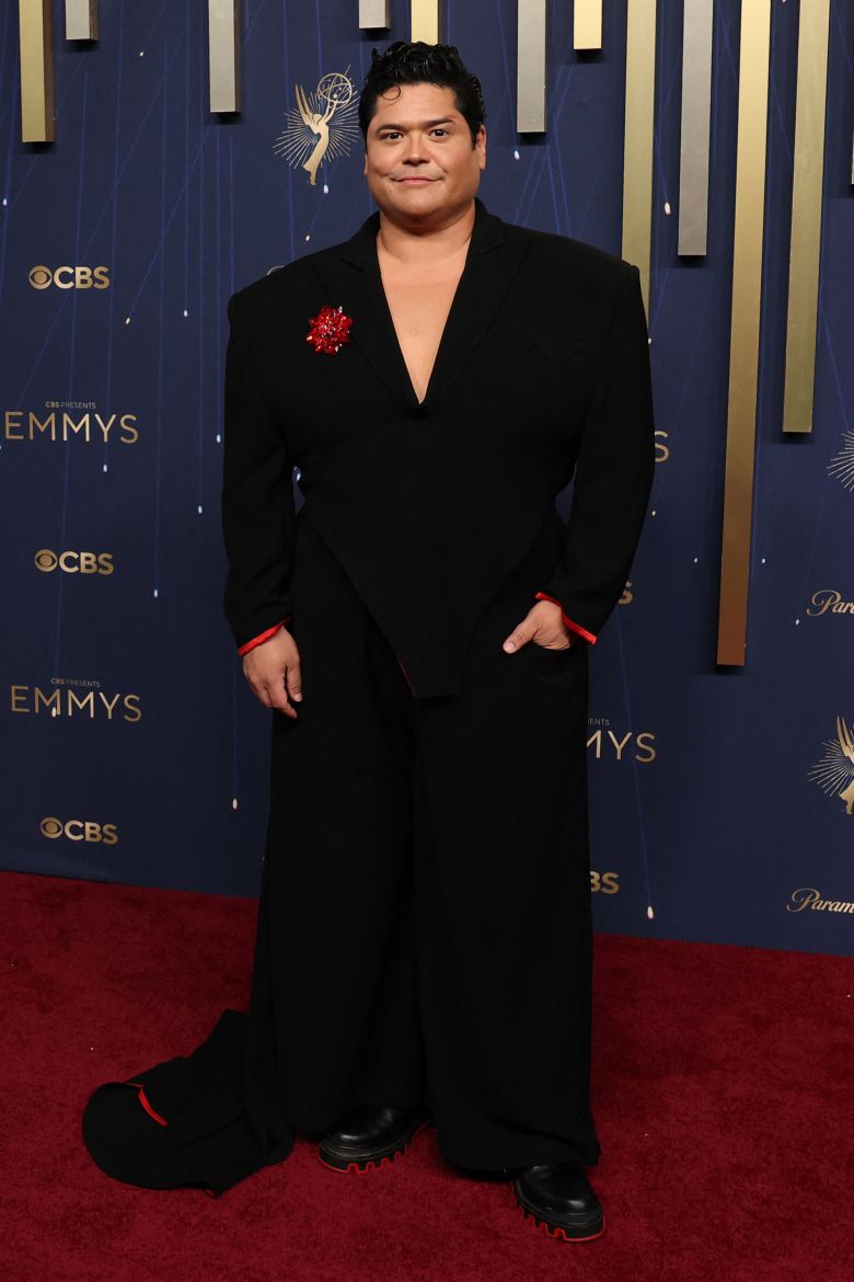 Actor Harvey Guillén's jacket became a train that swept behind him on the red carpet.