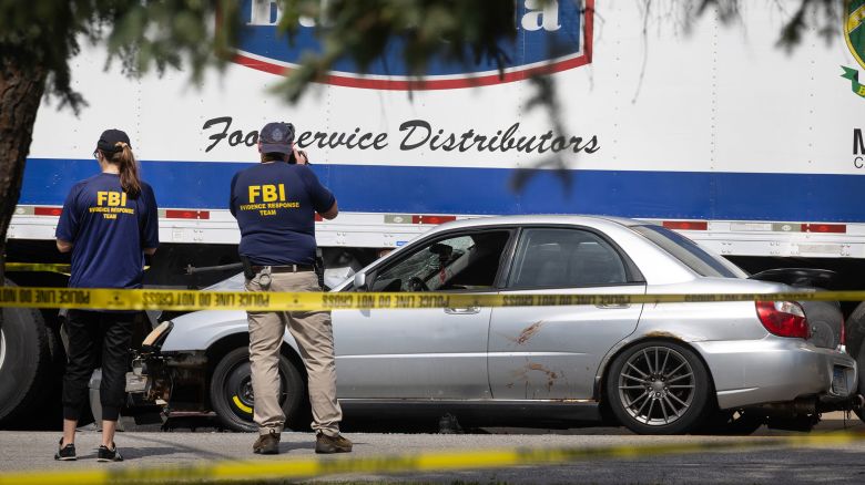FRANKLIN PARK, ILLINOIS - SEPTEMBER 12: Investigators collect evidence after a man crashed his vehicle after being fatally shot during a confrontation with ICE officers on September 12, 2025 in Franklin Park, Illinois. The Chicago area has seen a surge in ICE activity recently, part of the Trump administration's crackdown on undocumented immigrants in the area dubbed "Operation Midway Blitz".    (Photo by Scott Olson/Getty Images)