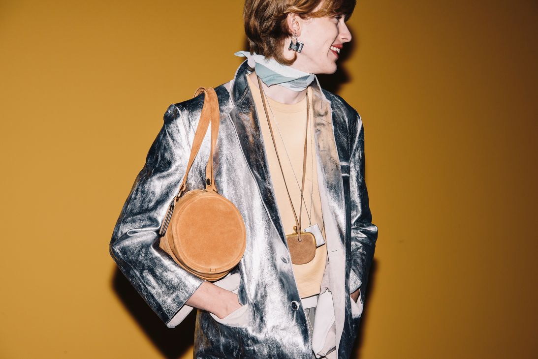 Coach’s latest accessories included mini duffels, mini coin purse pouches and mini books as earrings and necklaces.