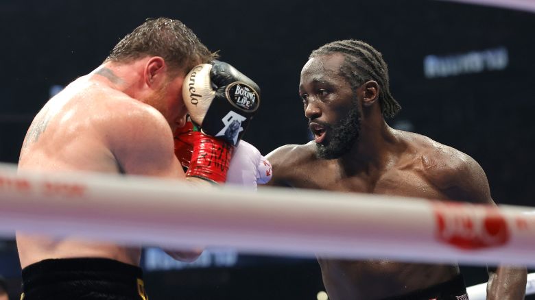 LAS VEGAS, NEVADA - SEPTEMBER 13: Terence Crawford (R) lands a right on Canelo Alvarez in their undisputed super middleweight title fight during Netflix's Canelo v Crawford Fight Night at Allegiant Stadium on September 13, 2025 in Las Vegas, Nevada. (Photo by Steve Marcus/Getty Images)