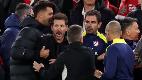LIVERPOOL, ENGLAND - SEPTEMBER 17: Diego Simeone, Manager / Head Coach of Atletico Madrid is restrained as he confronts fans after the late Liverpool winning goal during the UEFA Champions League 2025/26 League Phase MD1 match between Liverpool FC and Atletico de Madrid at Anfield on September 17, 2025 in Liverpool, England. (Photo by Marc Atkins/Getty Images)