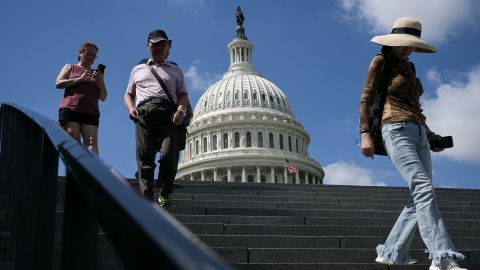 Visitors walk down stairs outside the US Capitol in Washington, DC, on September 18, 2025. (Photo by Oliver Contreras / AFP) (Photo by OLIVER CONTRERAS/AFP via Getty Images)          