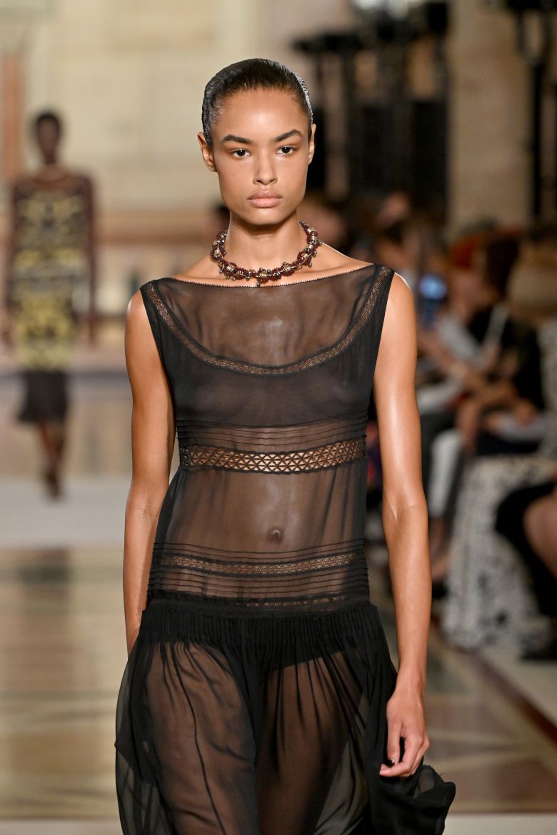 Pleated skirts, belted pants and suiting were offset by romantic, airy dresses.
