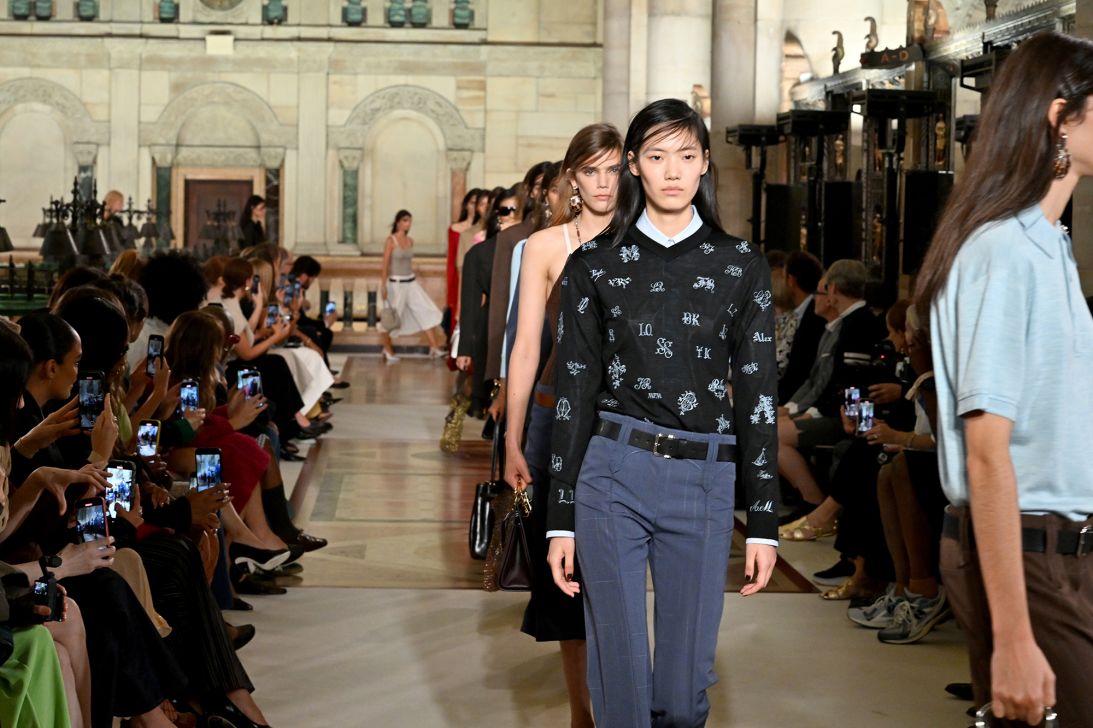 In Tory Burch's latest collection, both low-slung pants and monogrammed textiles featured prominently. Though many details of the collection were references to Burch's father and contained visual references from her childhood, she updated them — her memories of monograms became opportunities for her design team to leave their own initials on the clothes.