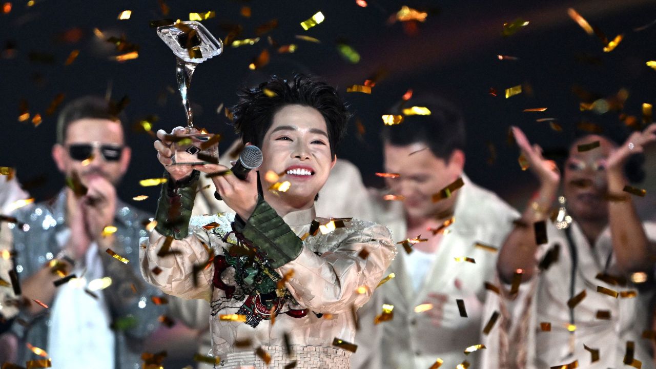 Vietnam's Duc Phuc lifts the trophy as he celebrates winning the "Intervision" song contest in Moscow on Sunday.