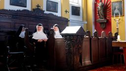 Sisters Rita (R), 81, Regina (L), 86, and Bernadette (C), 88, broke back into their former convent in September.