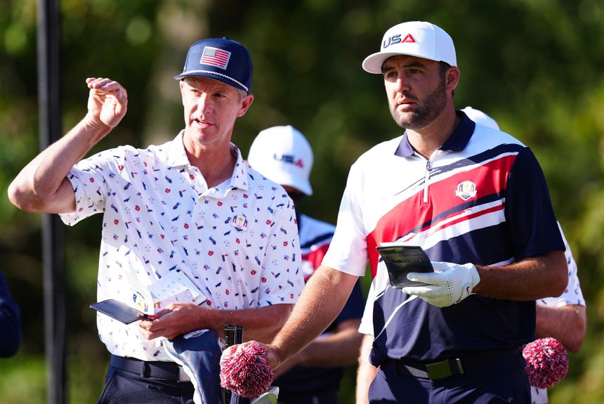 USA's Scottie Scheffler (right) with caddie Ted Scott during a practice round ahead of the Ryder Cup.