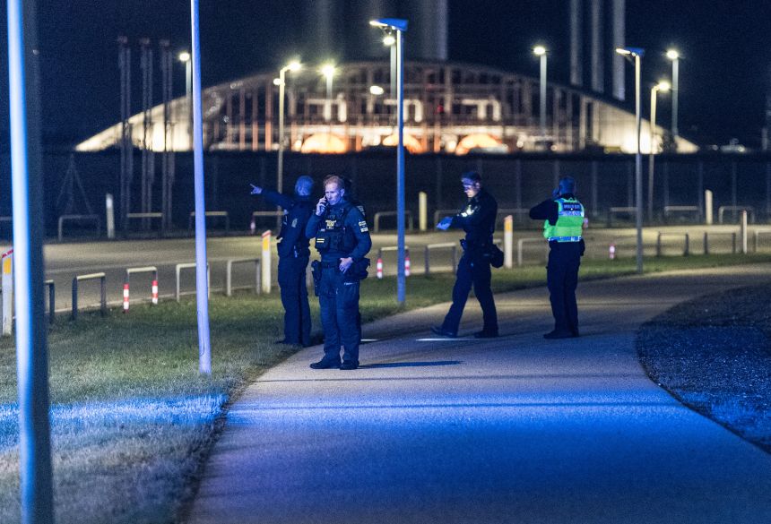 Danish police are seen at Copenhagen Airport where planes were halted due to the drone incursions.