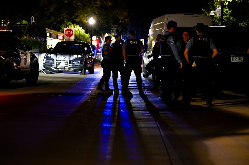 Minneapolis police officers gather outside an event on September 22 in Minneapolis.