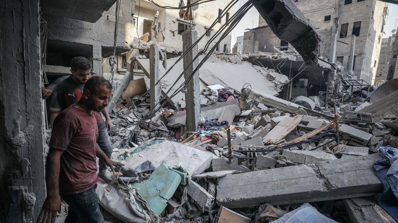 GAZA CITY, GAZA - SEPTEMBER 23: Palestinian residents inspect the area among the rubbles of destroyed buildings following Israeli attack on Al-Shati refugee camp in Gaza City, Gaza on September 23, 2025. (Photo by Khames Alrefi/Anadolu via Getty Images)