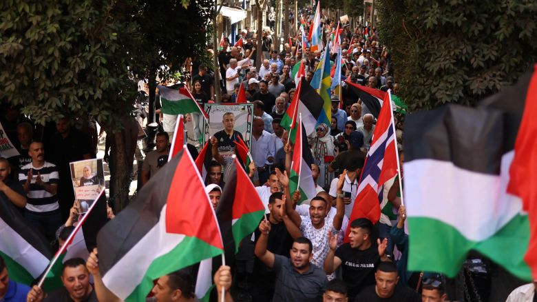 Palestinians chant slogans during a gathering in Ramallah in the Israeli occupied West Bank on September 23, 2025, to express their support to president Mahmud Abbas and to express their support for countries formally recognising the state of Palestine.