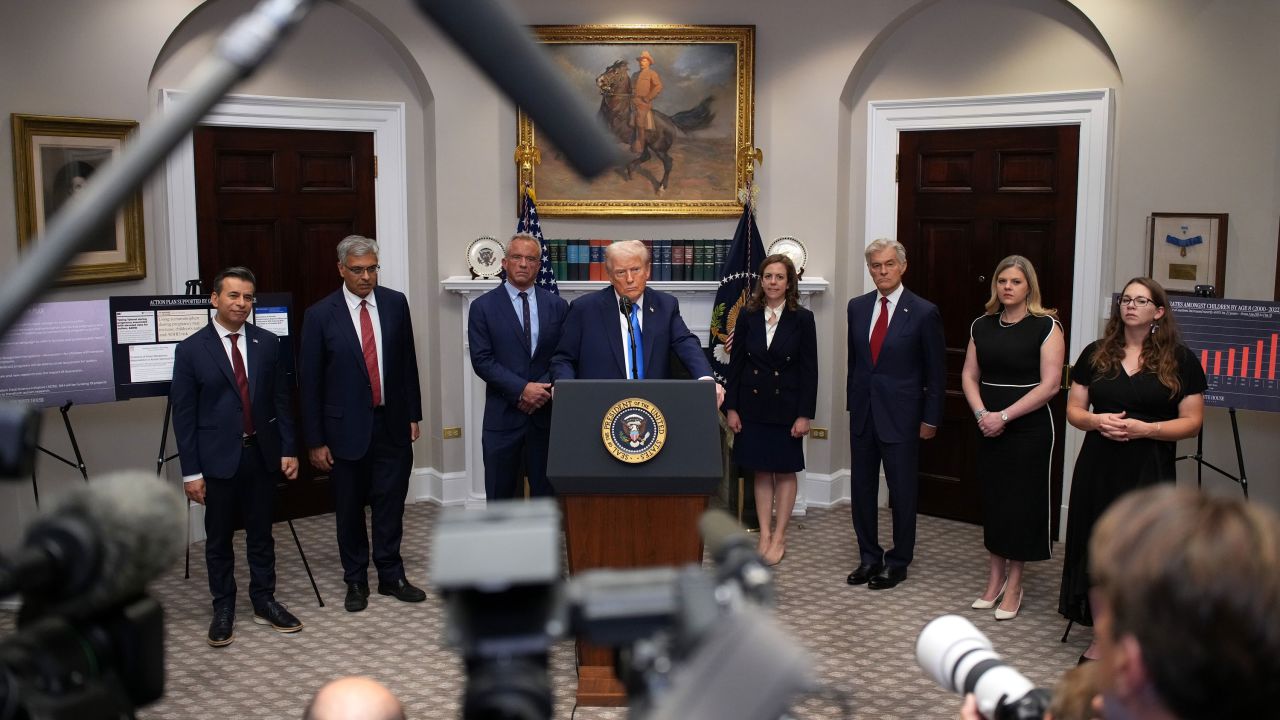 WASHINGTON, DC - SEPTEMBER 22: U.S. President Donald Trump (C) answers questions after making an announcement on “significant medical and scientific findings for America’s children” in the Roosevelt Room of the White House on September 22, 2025 in Washington, DC. Federal health officials suggested a link between the use of acetaminophen during pregnancy as a risk for autism, although many health agencies have noted inconclusive results in the research. (Photo by Andrew Harnik/Getty Images)
