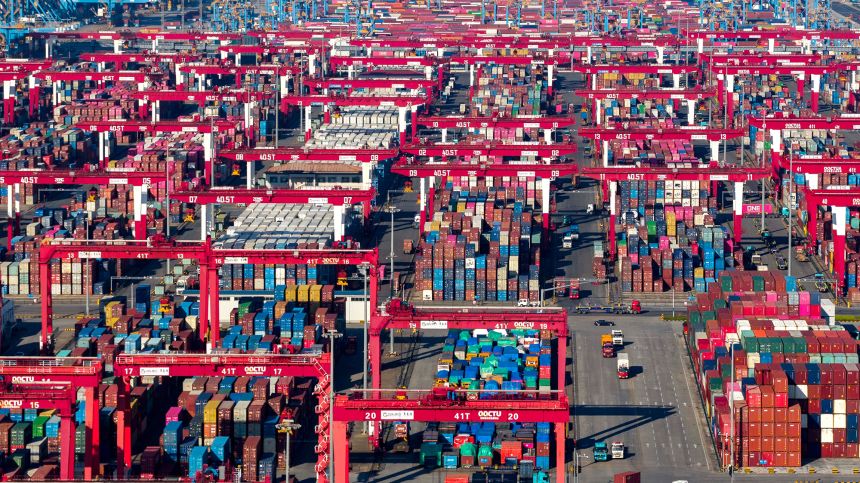 Containers pile up at Qingdao Port Qianwan Container Terminal in Shandong Province, China, on September 25, 2025.
