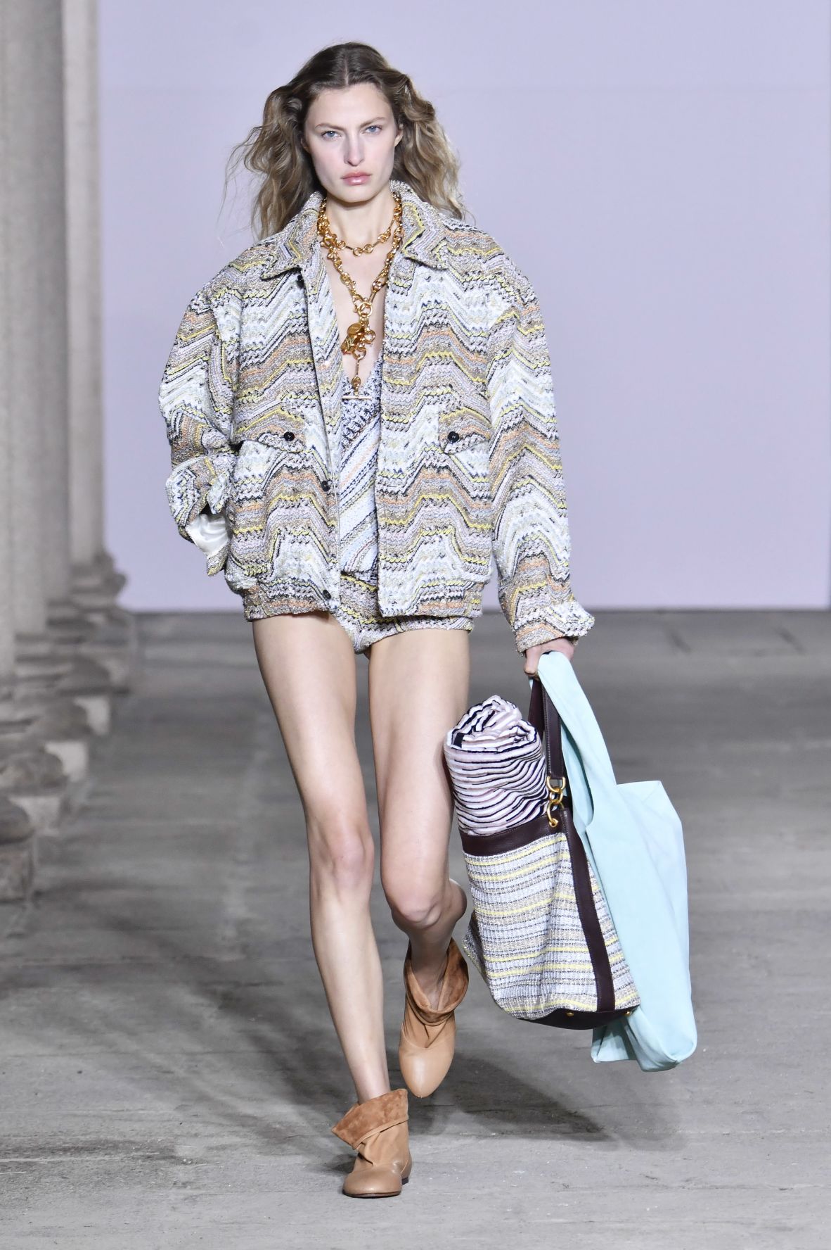 To breathe new life into the Italian knitwear brand Missoni, designer Alberto Caliri incorporated more contemporary silhouettes designed for sunny climes. They were worn by models with natural hair and minimal makeup.