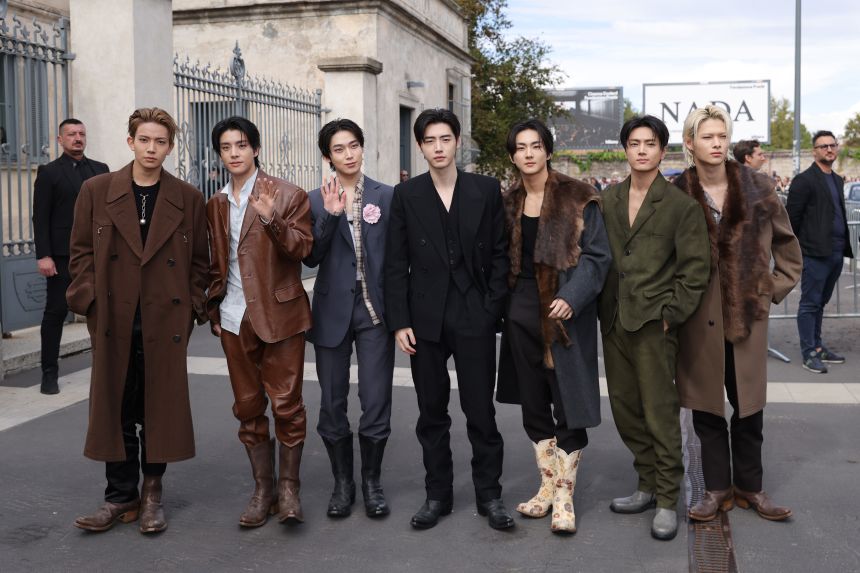 The members of South Korean boy band Enhypen, who are Prada brand ambassadors, attended the show.