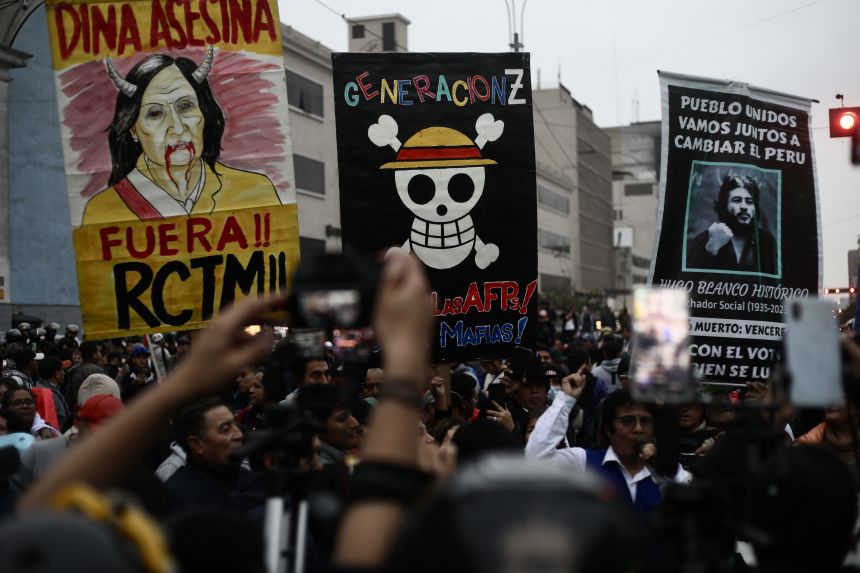 Gen Z protesters in Lima, Peru demonstrate alongside transport workers in a rally against corruption and crime on September 27.