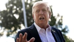President Donald Trump speaks to members of the media as he departs the White House September 26, 2025 in Washington, DC.