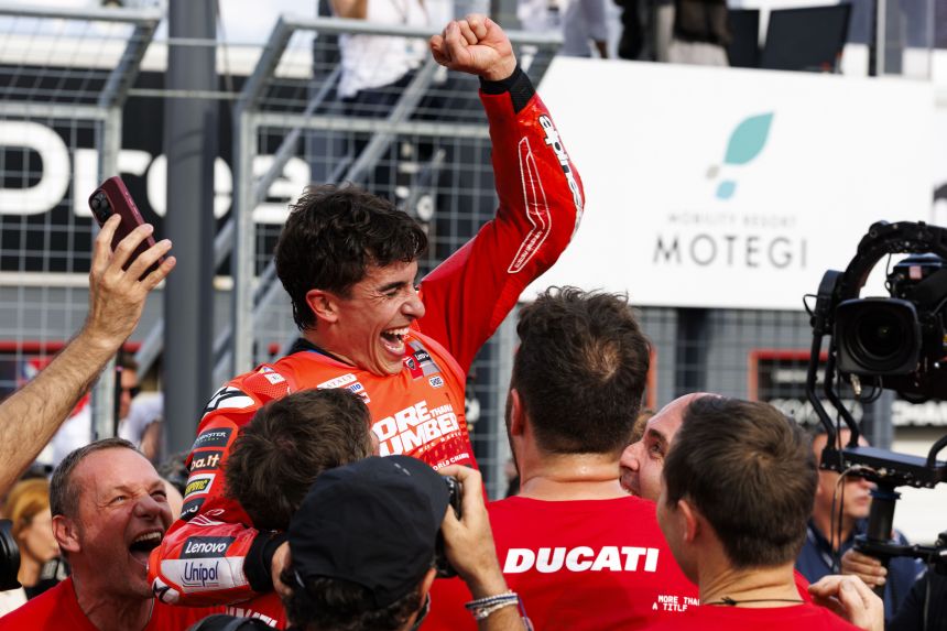 Márquez celebrates becoming world champion after the race during the 2025 Motul Grand Prix at Motegi.