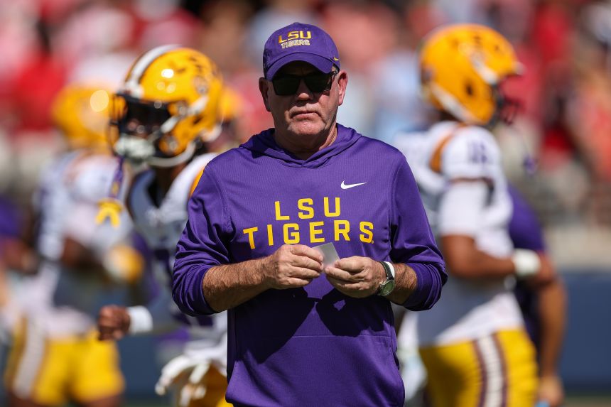 Brian Kelly, former head coach of the Louisiana State Tigers, is seen during warm-ups before the college football game against the Ole Miss Rebels. Kelly was fired earlier this week.