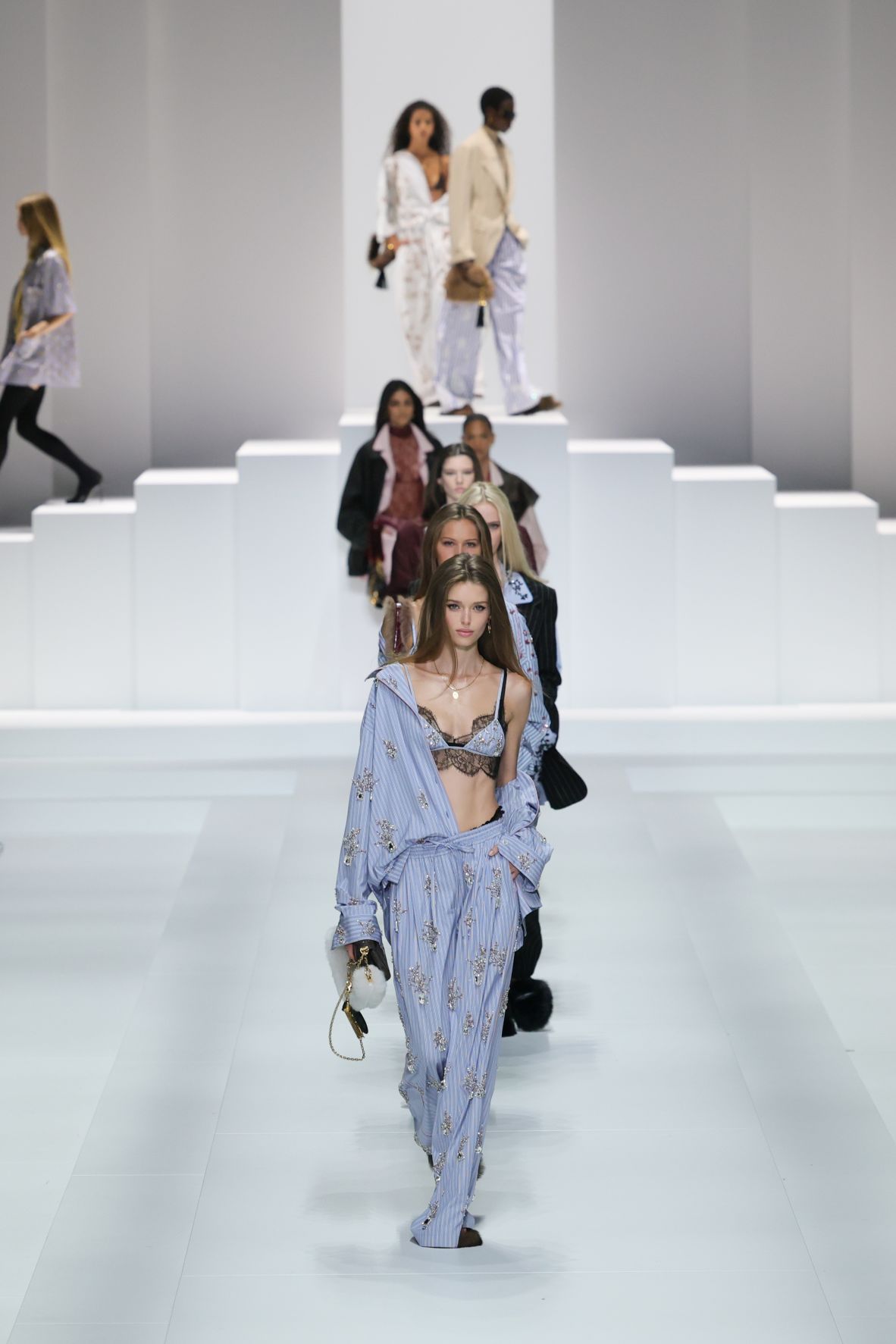 Pajama-inspired looks, which previously appeared on Dolce & Gabbana’s men’s runway in June, featured again in the women’s show — although this time they were much racier.