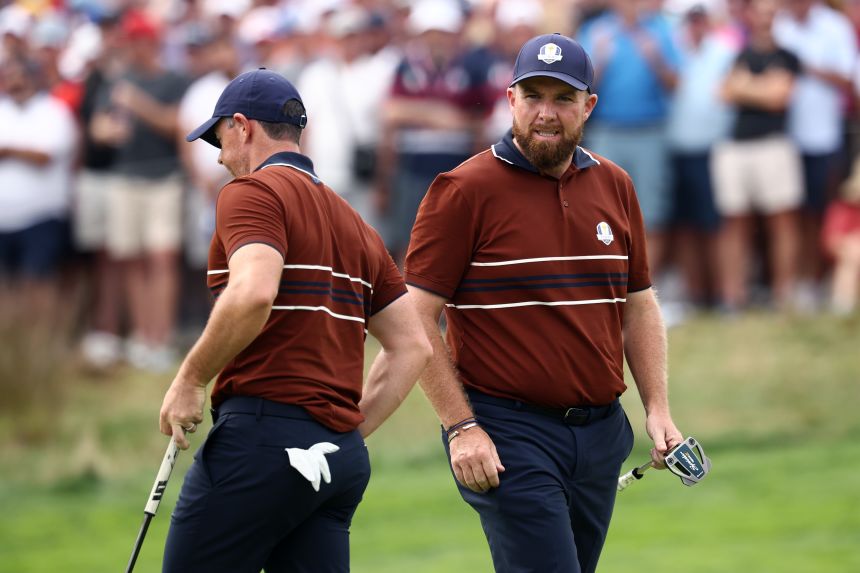 Team Europe's Shane Lowry and Rory McIlroy heard it from the Bethpage galleries throughout the day.  (Photo by Jared C. Tilton/Getty Images)
