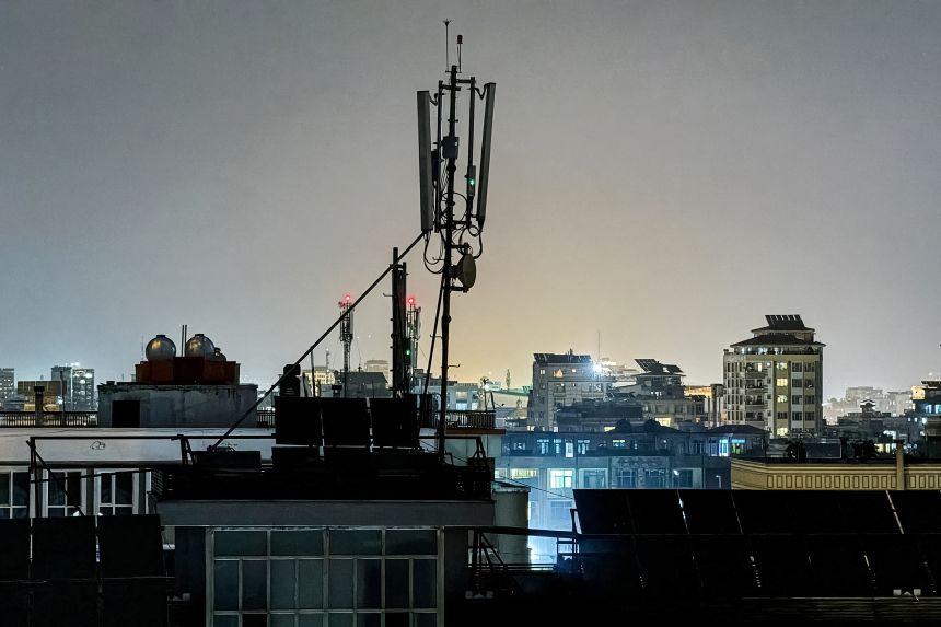 A telecommunications antenna installed for internet services on the rooftop of a house in Kabul on Monday.