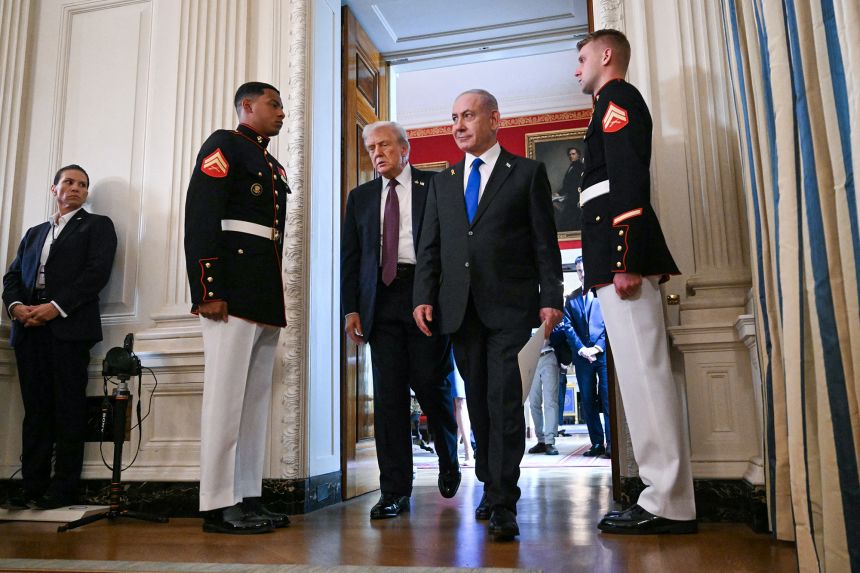 US President Donald Trump and Israeli Prime Minister Benjamin Netanyahu leave the State Dining Room of the White House after a press conference in Washington, DC on September 29, 2025.