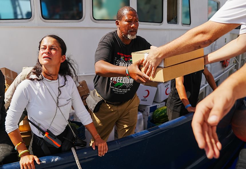 The Turkish Red Crescent giving food and medical aid to the flotilla.