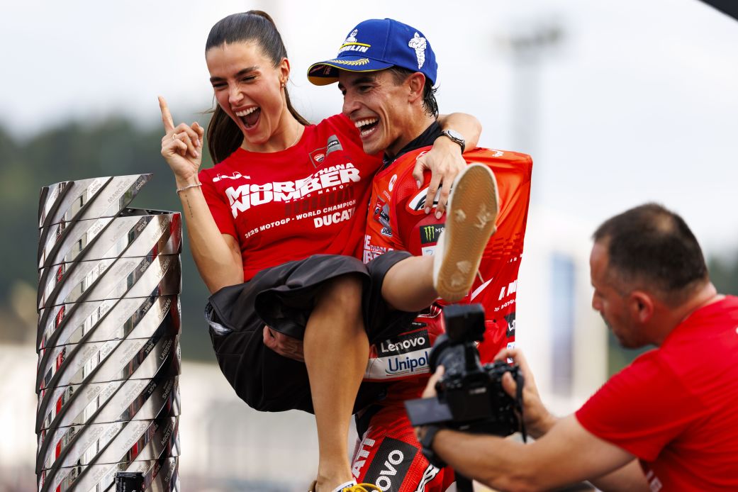 Ducati Lenovo team rider Marc Márquez and his girlfriend Gemma Pinto celebrate becoming world champion after the race during the 2025 Motul Grand Prix.