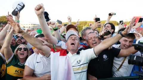 FARMINGDALE, NEW YORK - SEPTEMBER 28: Rory McIlroy of Team Europe celebrates with fans after Team Europe's 15-13 win over Team United States during the Sunday singles matches of the 2025 Ryder Cup at Black Course at Bethpage State Park Golf Course on September 28, 2025 in Farmingdale, New York. (Photo by Richard Heathcote/Getty Images)