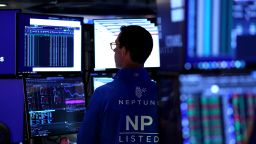A trader works on the floor of the New York Stock Exchange (NYSE) at the opening bell on October 1, 2025, in New York City. Stocks were higher Wednesday as the US government officially entered a shutdown.