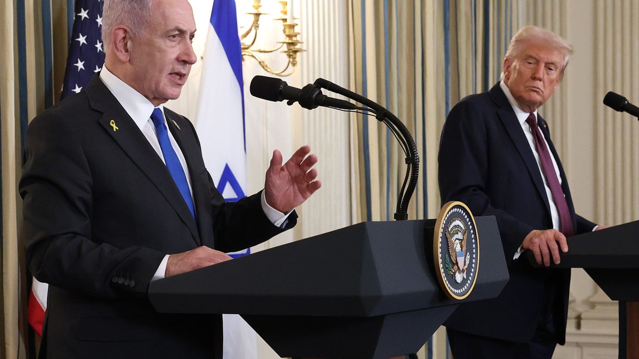 WASHINGTON, DC - SEPTEMBER 29: U.S. President Donald Trump (R) looks on as Israeli Prime Minister Benjamin Netanyahu delivers remarks during a joint news conference in the State Dining Room at the White House on September 29, 2025 in Washington, DC. President Trump welcomed Netanyahu for his fourth visit to the White House, where the two leaders met to discuss the latest U.S. backed plans to end the war in Gaza and secure the release of the remaining hostages held by Hamas.  (Photo by Win McNamee/Getty Images)