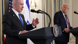 WASHINGTON, DC - SEPTEMBER 29: U.S. President Donald Trump (R) looks on as Israeli Prime Minister Benjamin Netanyahu delivers remarks during a joint news conference in the State Dining Room at the White House on September 29, 2025 in Washington, DC. President Trump welcomed Netanyahu for his fourth visit to the White House, where the two leaders met to discuss the latest U.S. backed plans to end the war in Gaza and secure the release of the remaining hostages held by Hamas.  (Photo by Win McNamee/Getty Images)