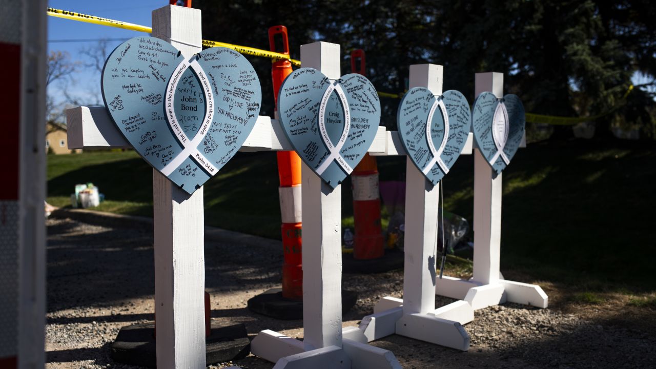Memorials set up for victims nearby the site of a shooting and fire at the Church of Jesus Christ of Latter-day Saints Michigan, on October 1, 2025 in Grand Blanc, Michigan.